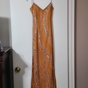 Orange and silver sequin gown